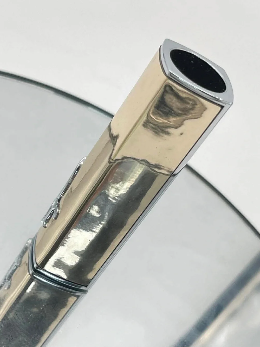 Dior Gold and Silver Logo Lipstick Holder